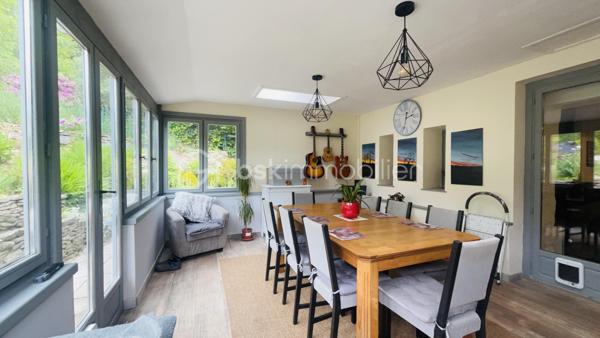 Située dans un environnement calme et rural, découvrez le charme de cette maison construite en 1949 sur un terrain d’environ 1900 m². 

Belle maison, entièrement rénovée en pierre de taille, offre un équilibre entre le charme de l’ancien et le confort moderne dans une tranquillité absolue. Elle permet également de profiter d’un espace  extérieur agréable grâce à son jardin aménagé et d’une piscine hors sol. 
La présence d’un hangar de 90m², d’un abri de jardin en bois et d’une dépendance à rénover de plus de 70m², sont  des plus pour les aventureux.

Ce bien est situé à la campagne de Landeleau, entre la ville de Carhaix et de Châteauneuf-du-Faou. 
Cette charmante maison est composée de : 
Au rez-de-chaussée 
- D’une entrée
- D’un séjour de 21m²
- D’une cuisine équipée de 17m² , 
- D’une véranda isolée et chauffée de 17m². 
A l’étage : 
- Une chambre parentale avec sa salle d’eau privative et son WC de 12m² ; 
- Deux pièces bien aménagées de 6m² et 5m² en loi Carrez 
- Salle de douche ; 
La véranda est ouverte sur sa terrasse et son agréable jardin. 

Il faut parler de l'aspect techniques  :
-	Huisseries en bois double vitrage
-	Chauffage électrique et poêle à bois
-	Volets battants au rez-de-chaussée
-       Isolation murs et toitures
-       Toiture en bon état 
-	VMC dans les toilettes du rez-de-chaussée 
-	Assainissement en fosse septique avec pompe de relevage. 

Le jardin est clos, sans vis-à-vis à l'arrière de la propriété. Terrain arboré et aménagé.   
Elle est à la recherche de nouveaux propriétaires qui pourraient être vous. Pour la visiter, me contacte au 07 64 41 12 36 ou par mail'e.barre@bskimmobilier.com.