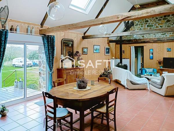 Propriété comprenant trois maisons dans un environnement calme et verdoyant