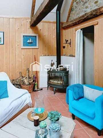 Propriété comprenant trois maisons dans un environnement calme et verdoyant