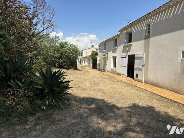 Maison avec trois chambres 