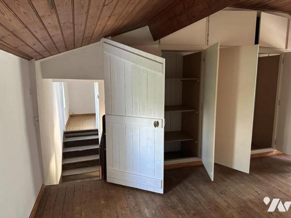 Maison avec trois chambres 