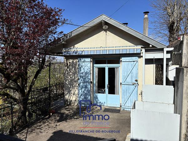 Maison avec garage et terrain attenant