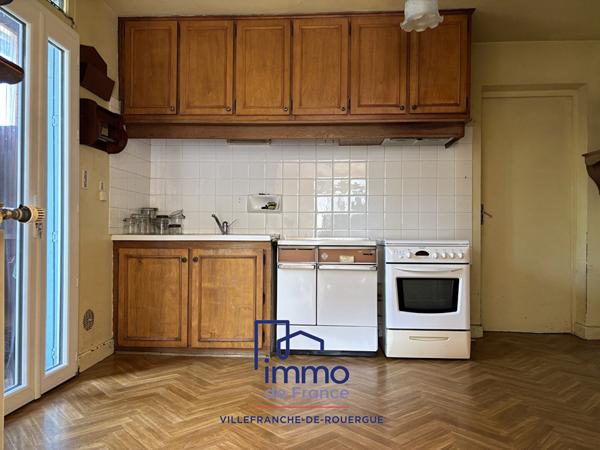 Maison avec garage et terrain attenant