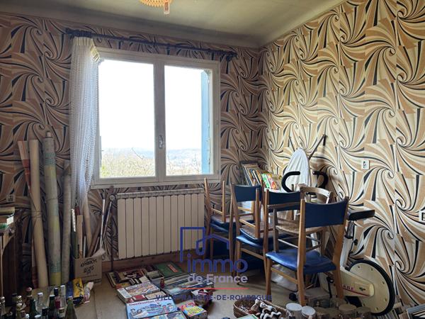 Maison avec garage et terrain attenant