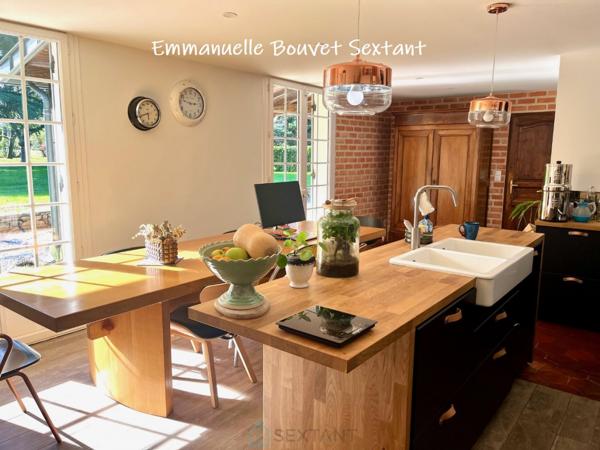 Maison en pierres, 4 chambres, 2 sde, garage, car-port, atelier, véranda, sur 4750 m2 clos.