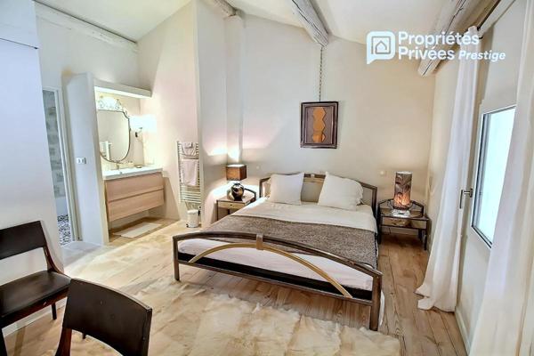 UZES à 9 minutes Propriété superbement restaurée, élégants espaces de vie, 5 chambres, maison d'invités, jardin avec piscine, village tous commerces