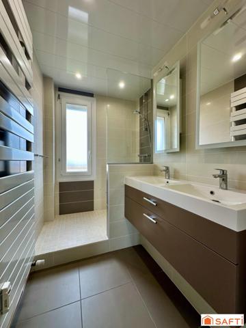 Appartement en résidence avec 3 chambres, garage et cave