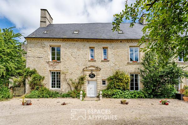 Ancien manoir dans un écrin de verdure