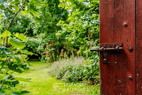 Ancien manoir dans un écrin de verdure