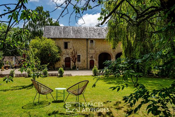 Ancien manoir dans un écrin de verdure