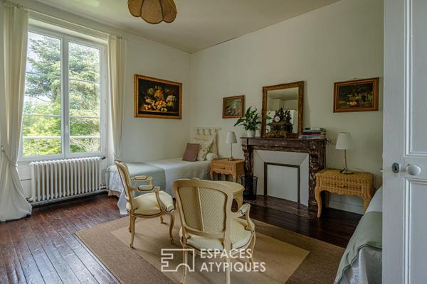 Ancien manoir dans un écrin de verdure