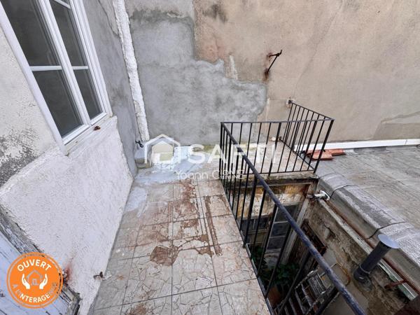 Appartement T1 bis 28 m2  à rénover centre ville avec balcon
