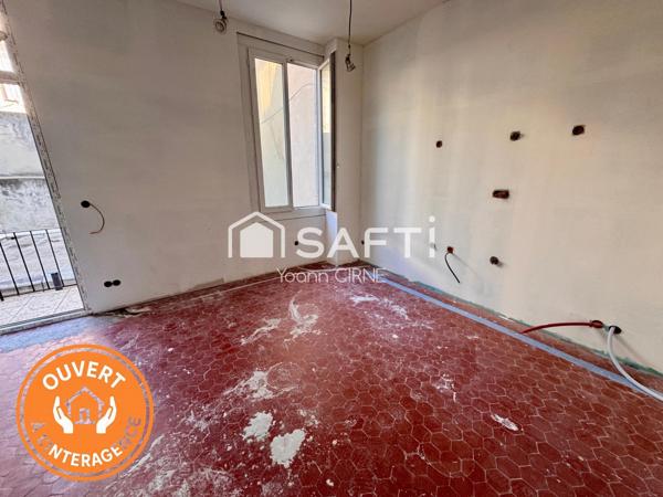 Appartement T1 bis 28 m2  à rénover centre ville avec balcon