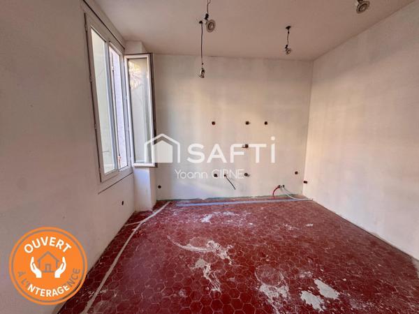 Appartement T1 bis 28 m2  à rénover centre ville avec balcon