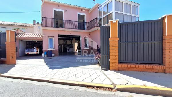 Maison 94 m² avec véranda, jardin et garages à vendre à Perpignan