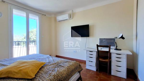 Maison 94 m² avec véranda, jardin et garages à vendre à Perpignan