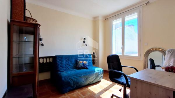 Maison 94 m² avec véranda, jardin et garages à vendre à Perpignan