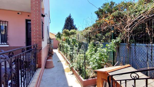 Maison 94 m² avec véranda, jardin et garages à vendre à Perpignan