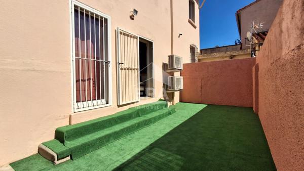 Maison 94 m² avec véranda, jardin et garages à vendre à Perpignan
