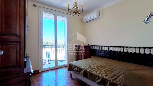 Maison 94 m² avec véranda, jardin et garages à vendre à Perpignan