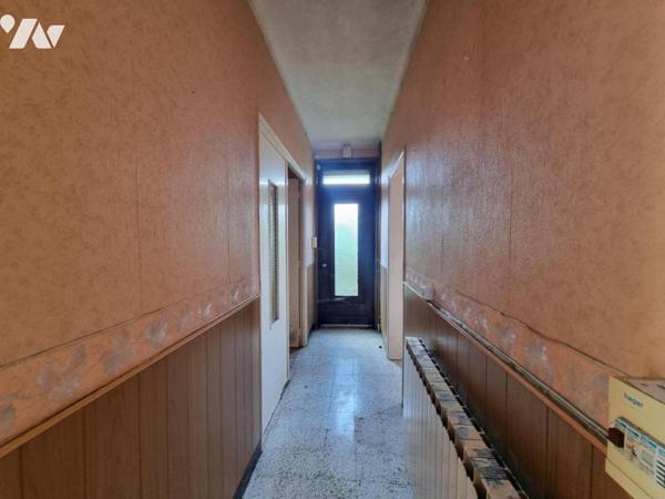 Ancien corps de ferme situé à LISBOURG