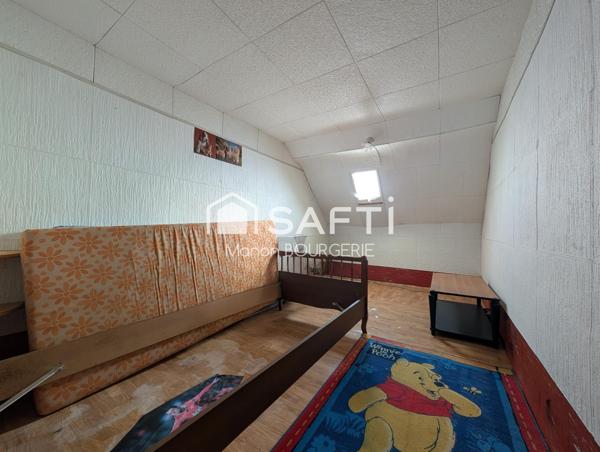 Maison de bourg 62 m² à rénover avec dépendance et jardin