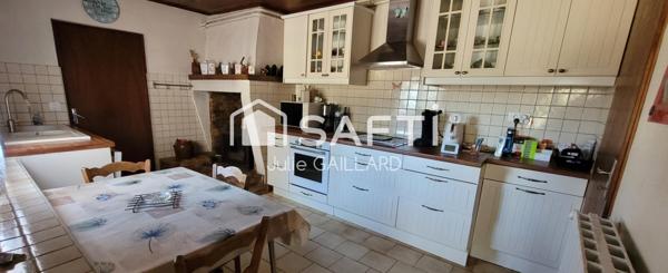 Maison en pierre sur un parc arboré de 4453 m2