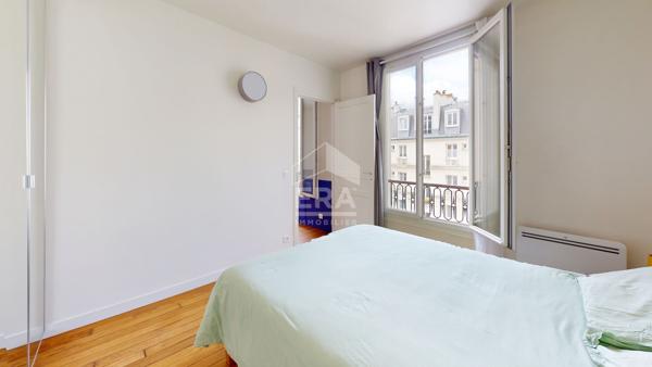 Appartement Paris 2 pièces traversant