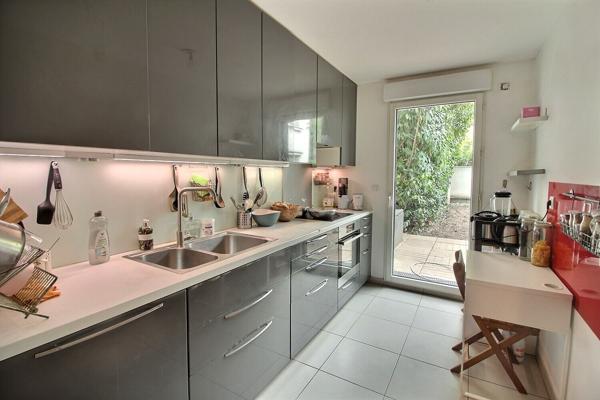 Suresnes Carnot Gambetta : Appartement familial de 4 pièces avec jardin privatif, terrasse, balcon et parking
