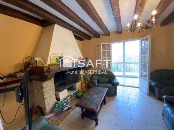 Belle maison style périgourdin avec jardin et grand garage.