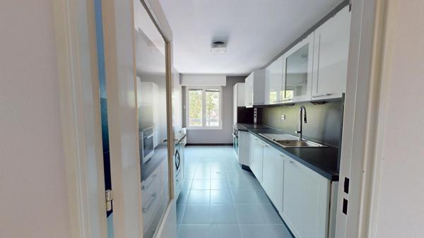 Appartement familial de 102 m² avec ascenseur, double garage et fort potentiel – Mulhouse centre
