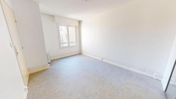Appartement familial de 102 m² avec ascenseur, double garage et fort potentiel – Mulhouse centre