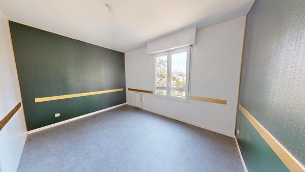 Appartement familial de 102 m² avec ascenseur, double garage et fort potentiel – Mulhouse centre