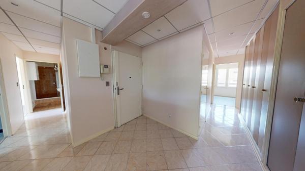 Appartement familial de 102 m² avec ascenseur, double garage et fort potentiel – Mulhouse centre