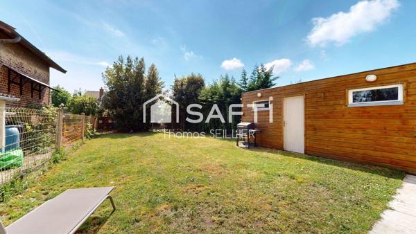 Maison lumineuse avec garnd jardin et garage