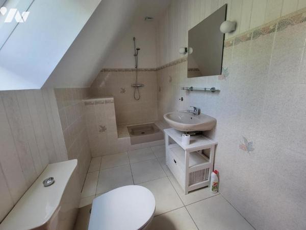 MAISON FAMILIALE DANS UN ÉCRIN DE VERDURE