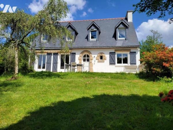 MAISON FAMILIALE DANS UN ÉCRIN DE VERDURE