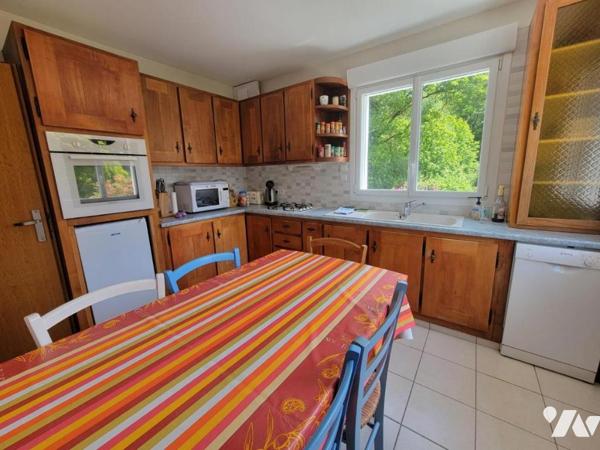 MAISON FAMILIALE DANS UN ÉCRIN DE VERDURE