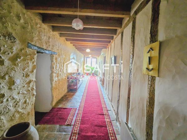 PROPRIÉTÉ EN PIERRE AVEC DEPENDANCE SUR 2,4 HECTARES