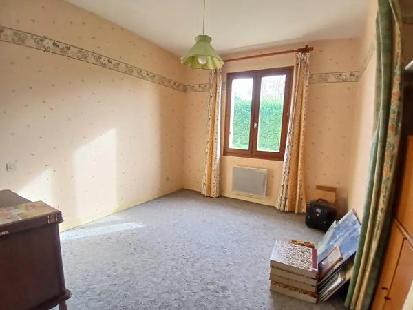 Maison de plain-pied - 4 chambres - terrain idéalement situé