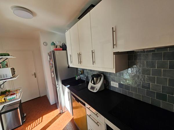 Centre-ville de Puteaux : Appartement de 4 pièces de 82m² avec balcons et cave