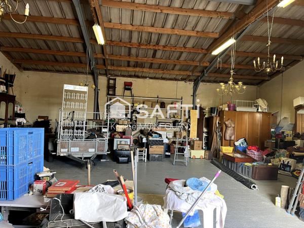 Maison habitable de plain-pied avec grand hangar