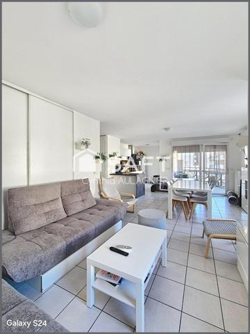 T3 transformé en T2 avec balcon et garage en sus