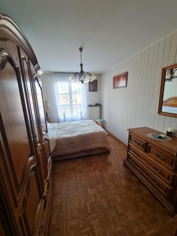 Appartement type 4 avec ascenseur, 2 garages et une cave en plein centre de Saint Galmier