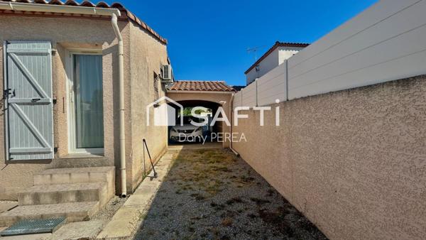 Charmante villa de 115 m2, deux chambres, deux salles d'eau, jardin et garage.