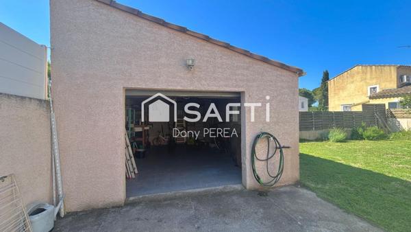 Charmante villa de 115 m2, deux chambres, deux salles d'eau, jardin et garage.