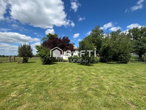 Maison de 180m2 avec garage et 2000m2 de jardin clôturé