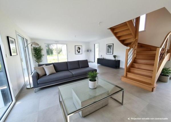 GUIDEL : Maison neuve dans un environnement verdoyant