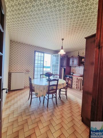 MAISON D'HABITATION de 100 m² - 3 chambres -