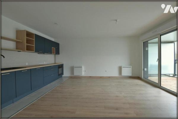APPARTEMENT T3 AVEC ASCENSEUR GARAGE ET TERRASSE LE RHEU